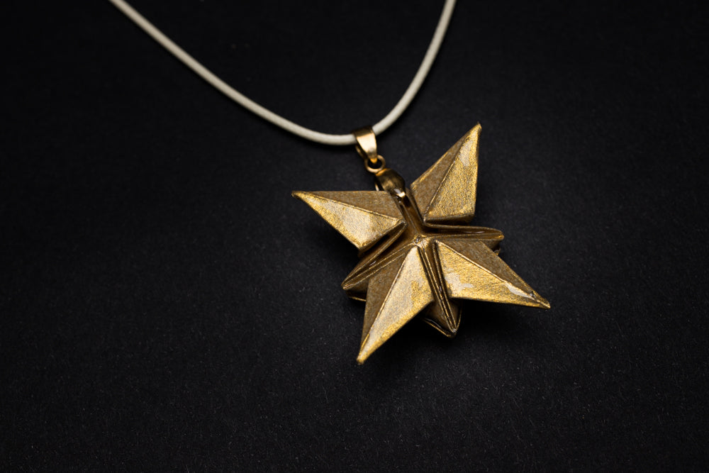 Colgante Origami Estrella de Ocho Puntas | Arte en Miniatura con Resina
